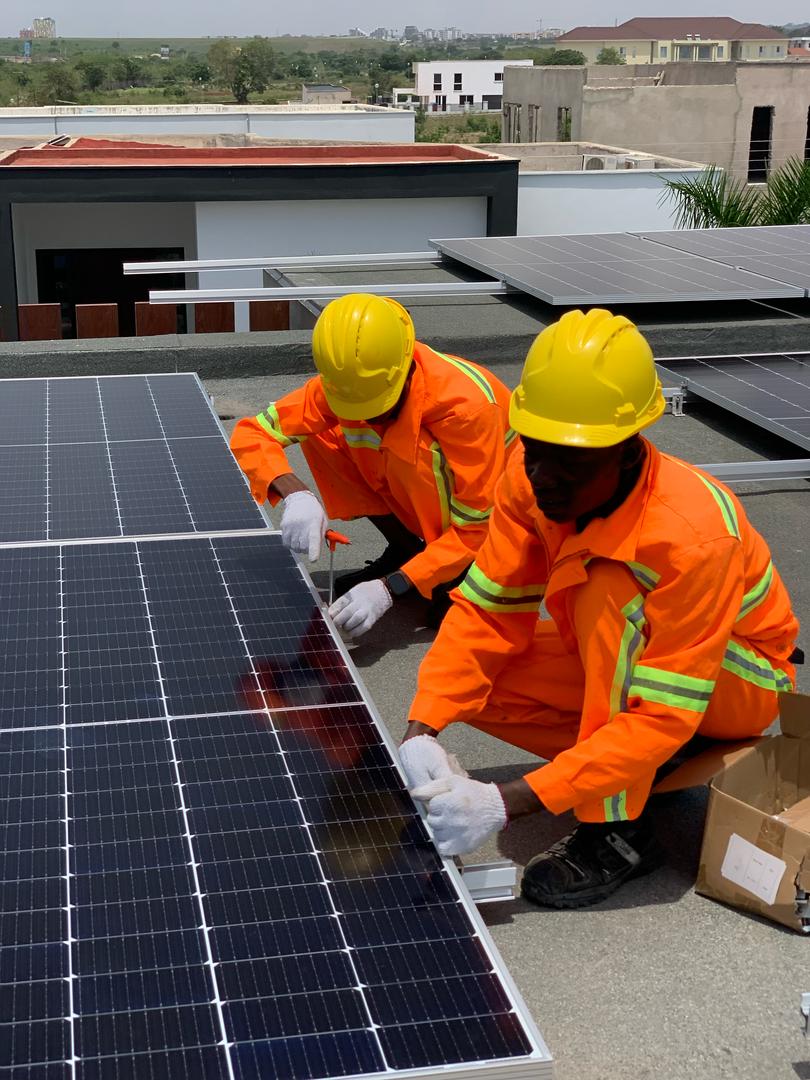 Solar engineer with wind turbines